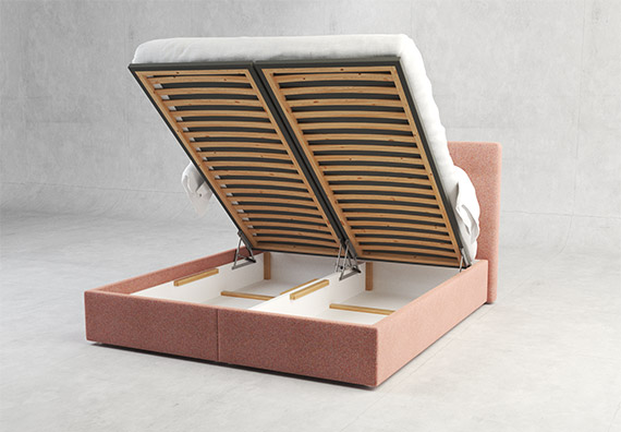 Funkcija dvižnega predala pri oblazinjeni postelji Kiara.